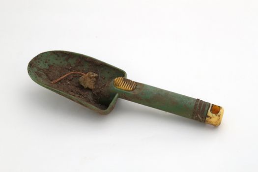 Garden trowel against a plain white background.