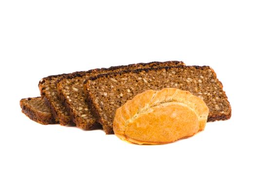 Baked homemade Karaite dish and healthy slice of organic bread with grains isolated on white background. Healthy food.