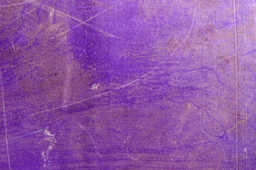 Background of ancient grunge impeachment plywood wall painted purple.