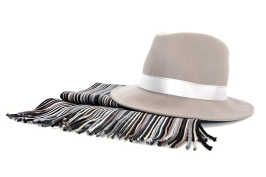 grey hat and scarf over white background