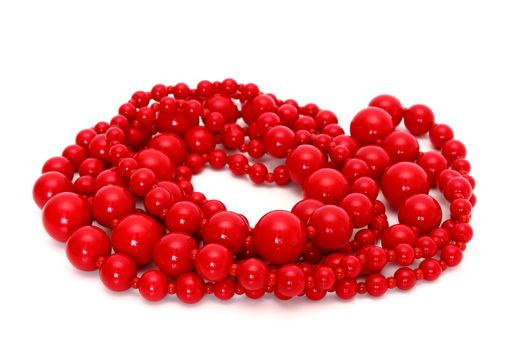 strand with red beads on a white background
