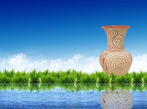 earthenware on the grass with the bright sky