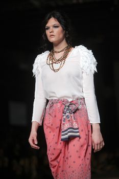 ZAGREB, CROATIA - MARCH 22: Fashion model wears clothes made by Anamarija Asanovic on "CRO A PORTER" show on March 22, 2012 in Zagreb, Croatia.
