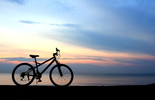 Silhouette of a Bike on the Beach