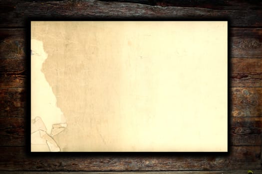 Old brown paper on wood panel