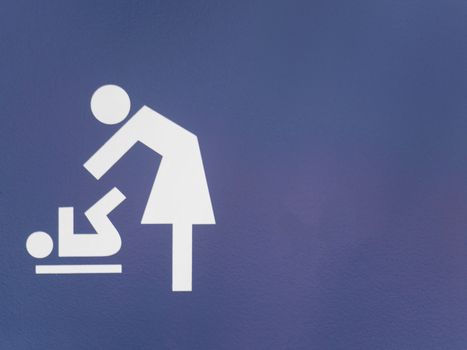 Diaper changing room sign in blue