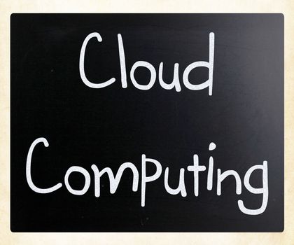 "Cloud computing" handwritten with white chalk on a blackboard