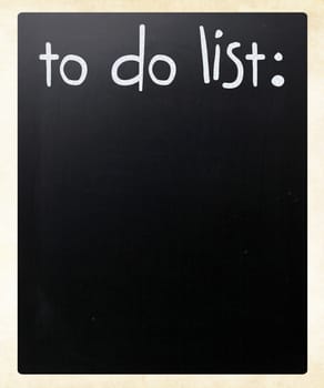 "To do list" handwritten with white chalk on a blackboard