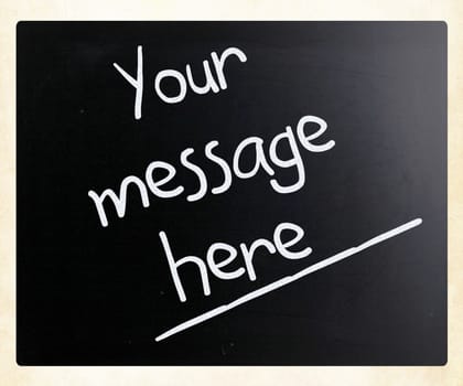 "Your message here" handwritten with white chalk on a blackboard