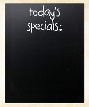 "Today's specials" handwritten with white chalk on a blackboard