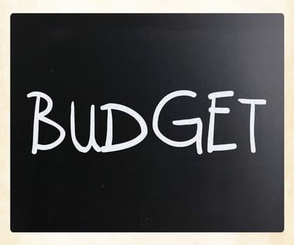 "Budget" handwritten with white chalk on a blackboard