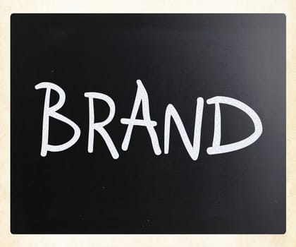 "Brand" handwritten with white chalk on a blackboard