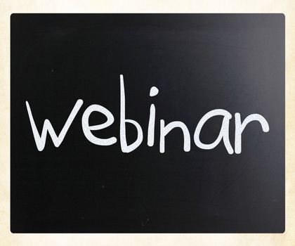 The word "Webinar" handwritten with white chalk on a blackboard