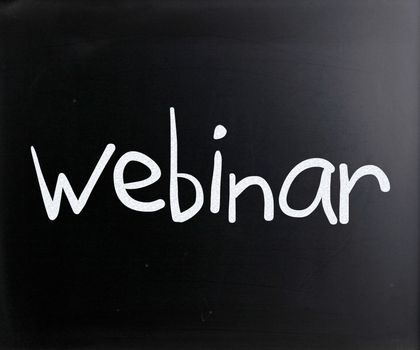 The word "Webinar" handwritten with white chalk on a blackboard