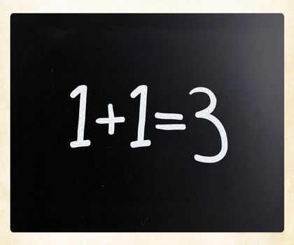 "1+1=3" handwritten with white chalk on a blackboard