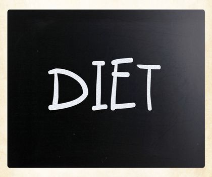 "Diet" handwritten with white chalk on a blackboard