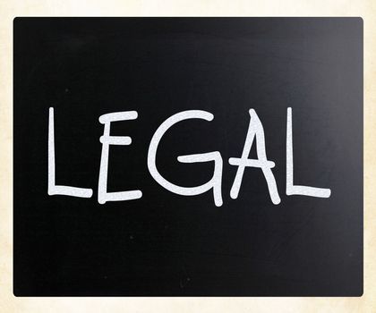 The word "Legal" handwritten with white chalk on a blackboard