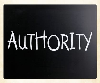 "Authority" handwritten with white chalk on a blackboard