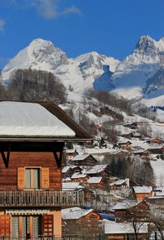 View on the Aravis mountains from the Grand-Bornand with its beautiful wooden chalets, France