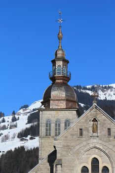 Tower of the Church Notre Dame de l'Assomption in winter, Grand-Bornant, France