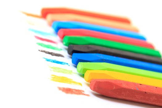 Group of Crayons stacked on white background