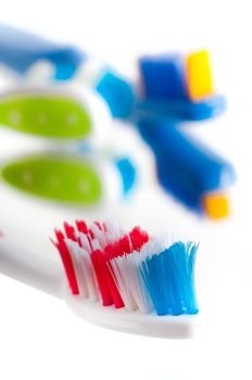 Close-up colorful toothbrush on a white background