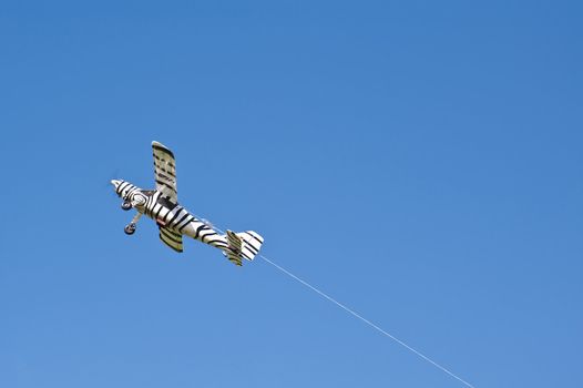 Flying model airplane with blue sky