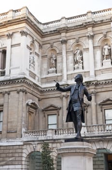 LONDON, UK - JANUARY 13: Statue of Sir Joshua Reynolds in the atrium of the Royal Academy of Arts. January 13, 2012 in London. Burlington House has been the home of the Royal Academy since 1867.