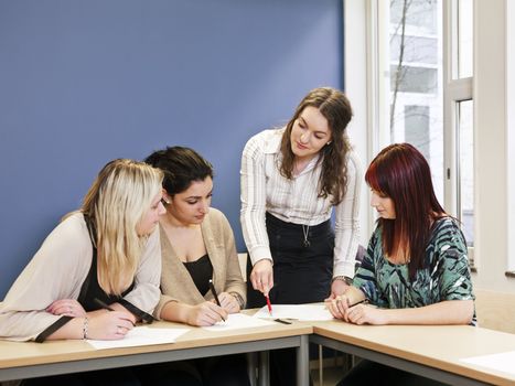 Four girls groupwork in the classroom