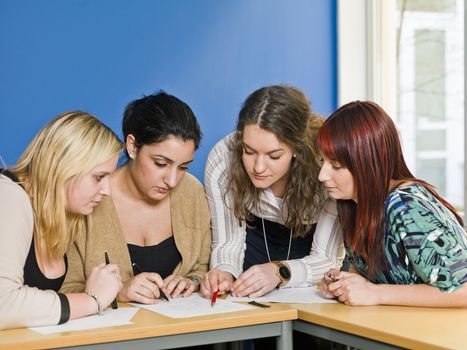 Four girls groupwork in the classroom