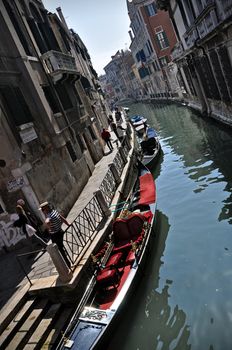 A typical water channel named Rio with gondole - Venezia - Italy