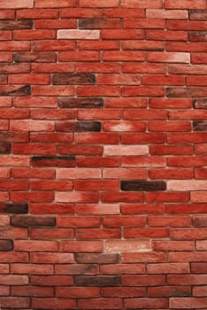 Red decorative bricks wall vertical as background