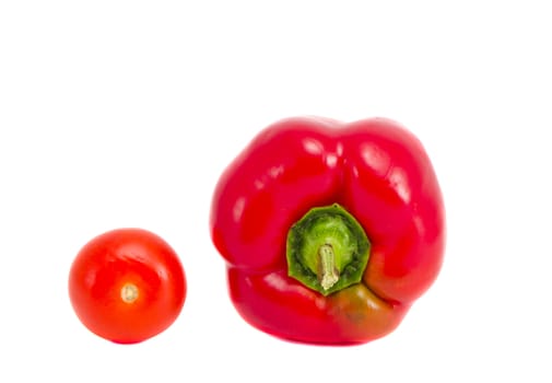 red pepper and tomato isolated on white background. healthy natural organic vegetables.