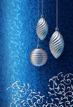 Silver Christmas decoration on blue brocade fabric pattern background