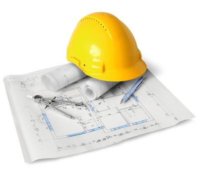Construction drawings, tools and hard hat on white background isolated