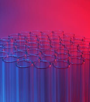 Laboratory test tubes red blue background