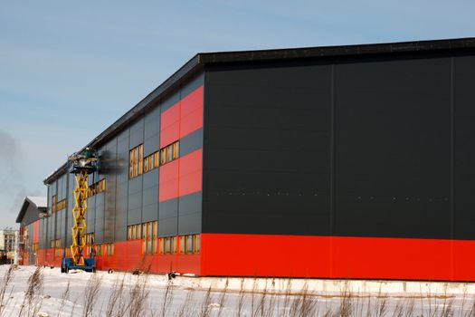building new warehouse on a sunny winter day