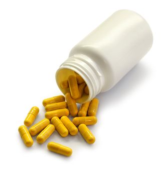 Blank medicine pot open with yellow drug capsular