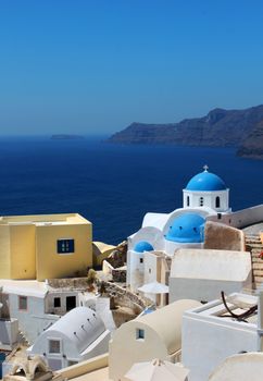 Greek church on Oia Santorini caldera blue sea view