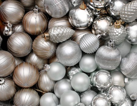 Lots of silver Christmas Decoration glass baubles background