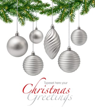 Silver Christmas decoration and spruce branches on white background