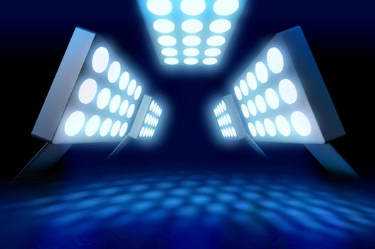 Stadium style premiere lights illuminating blue surface on dark background