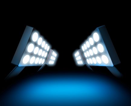 Stadium style lights illuminating blue surface