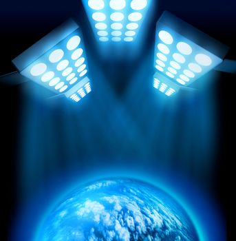 World premiere lights illuminating blue globe on dark background
