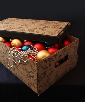 Carton box filled with Christmas decoration balls