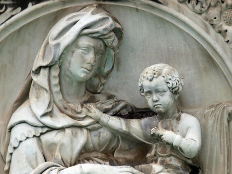 Madonna and Child . Panel of the Fonte Gaia (Fountain of Joy), Piazza del Campo, Siena.