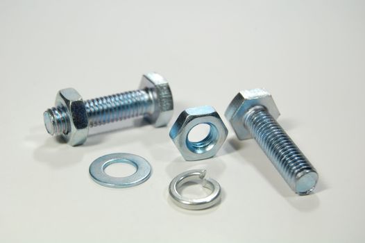 A set of shiny metal nuts and bolts for do-it-yourself stuff or repairing/replacing old parts