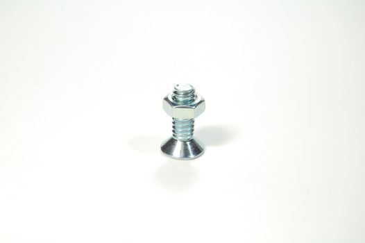 A set of shiny metal nut and bolt for do-it-yourself stuff or repairing/replacing old parts