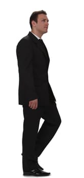 Image of a young businessman walking, isolated against a white background.