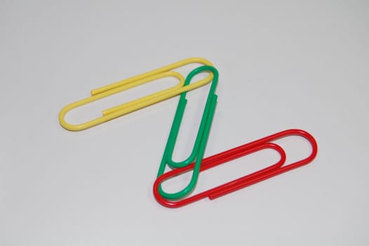 colorful paper clips isolated